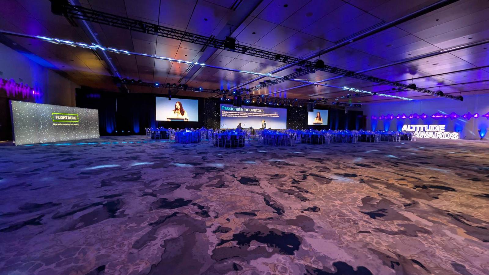 Awards gala ballroom with freestanding LED wall, three screens and dimensional lettering